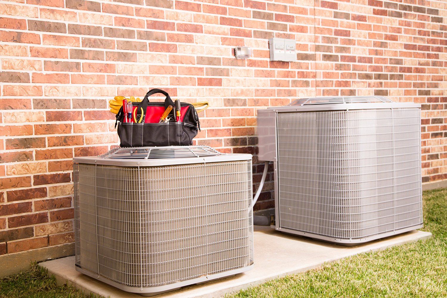 Work Tools on Air Conditioners | Lafayette, LA | Huval's Heating & Air Conditioning, Inc.