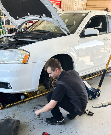 Our Mechanic is Repairing a Vehicle at Mid-Illini Auto Center in North Pekin, IL