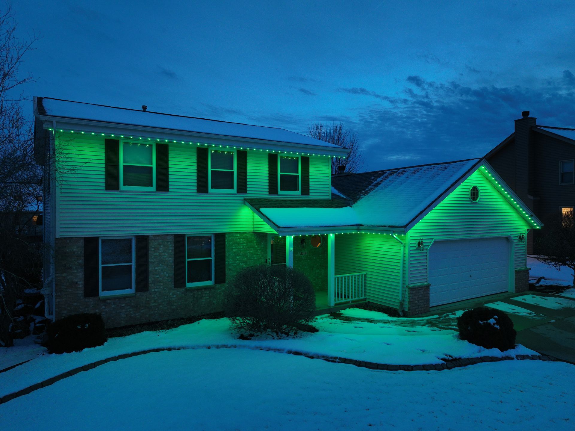 A house with green lights on it