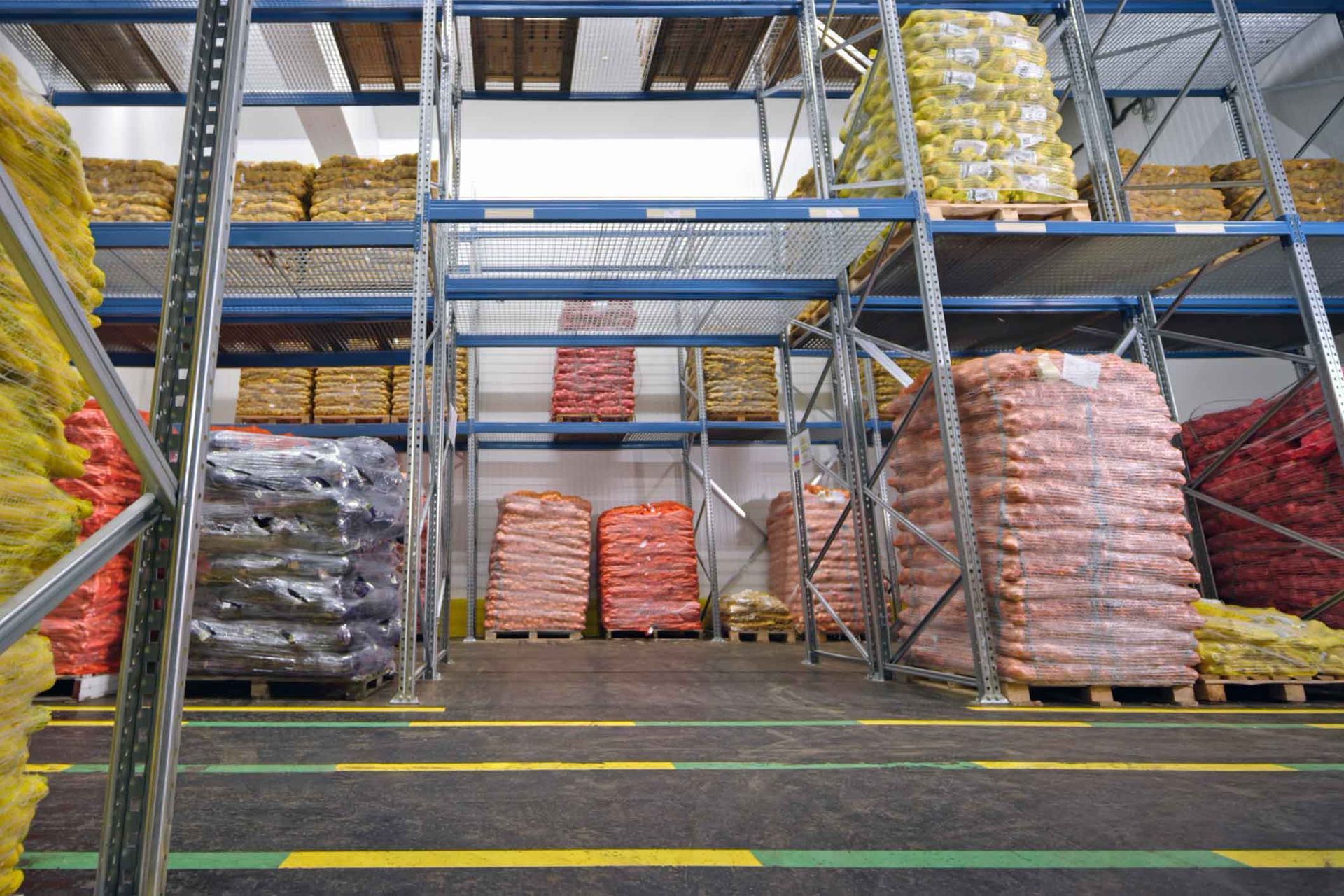 A warehouse filled with lots of bags of food