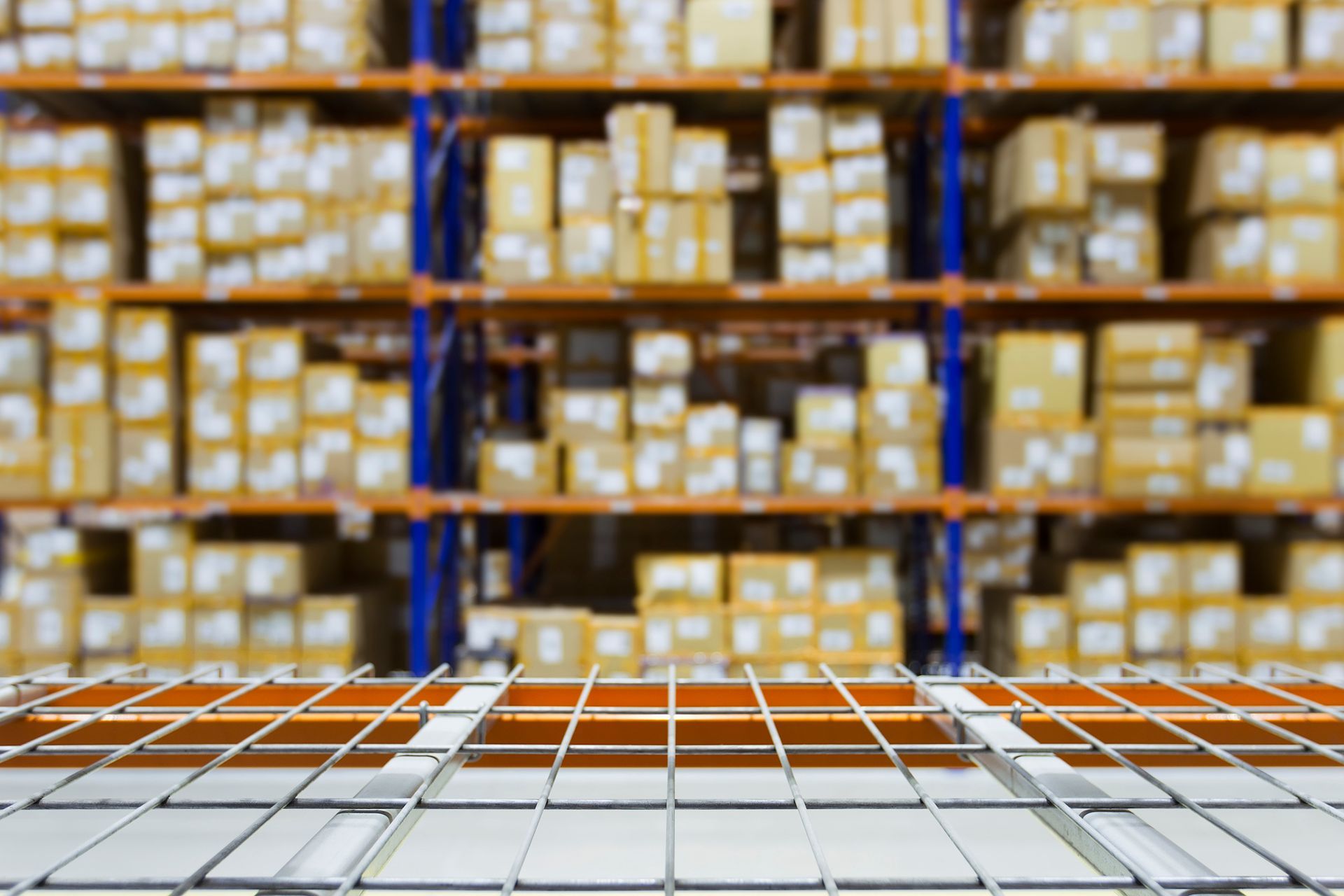 A warehouse filled with lots of boxes and shelves.