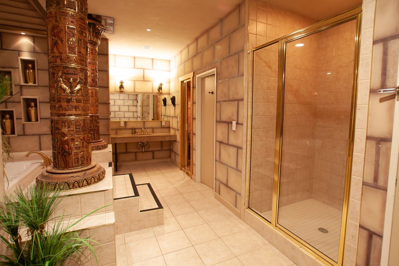 A bathroom with a walk in shower and a bathtub