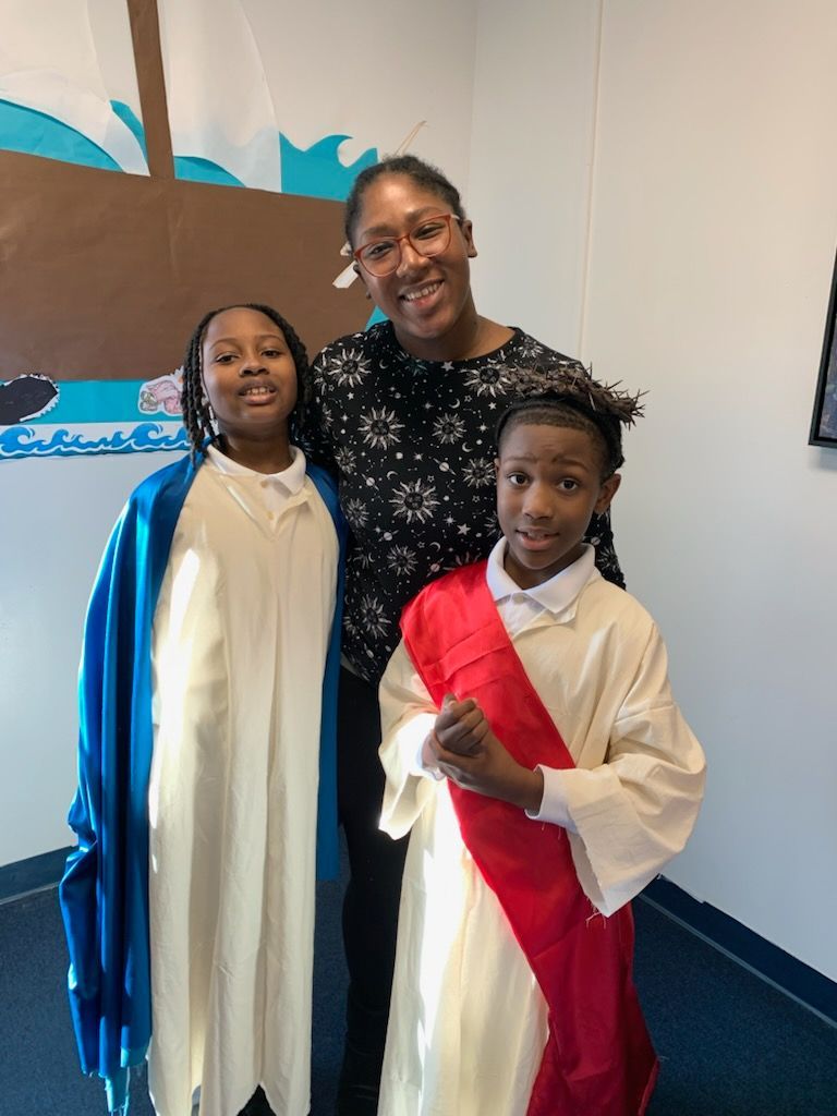 Teacher and students in event