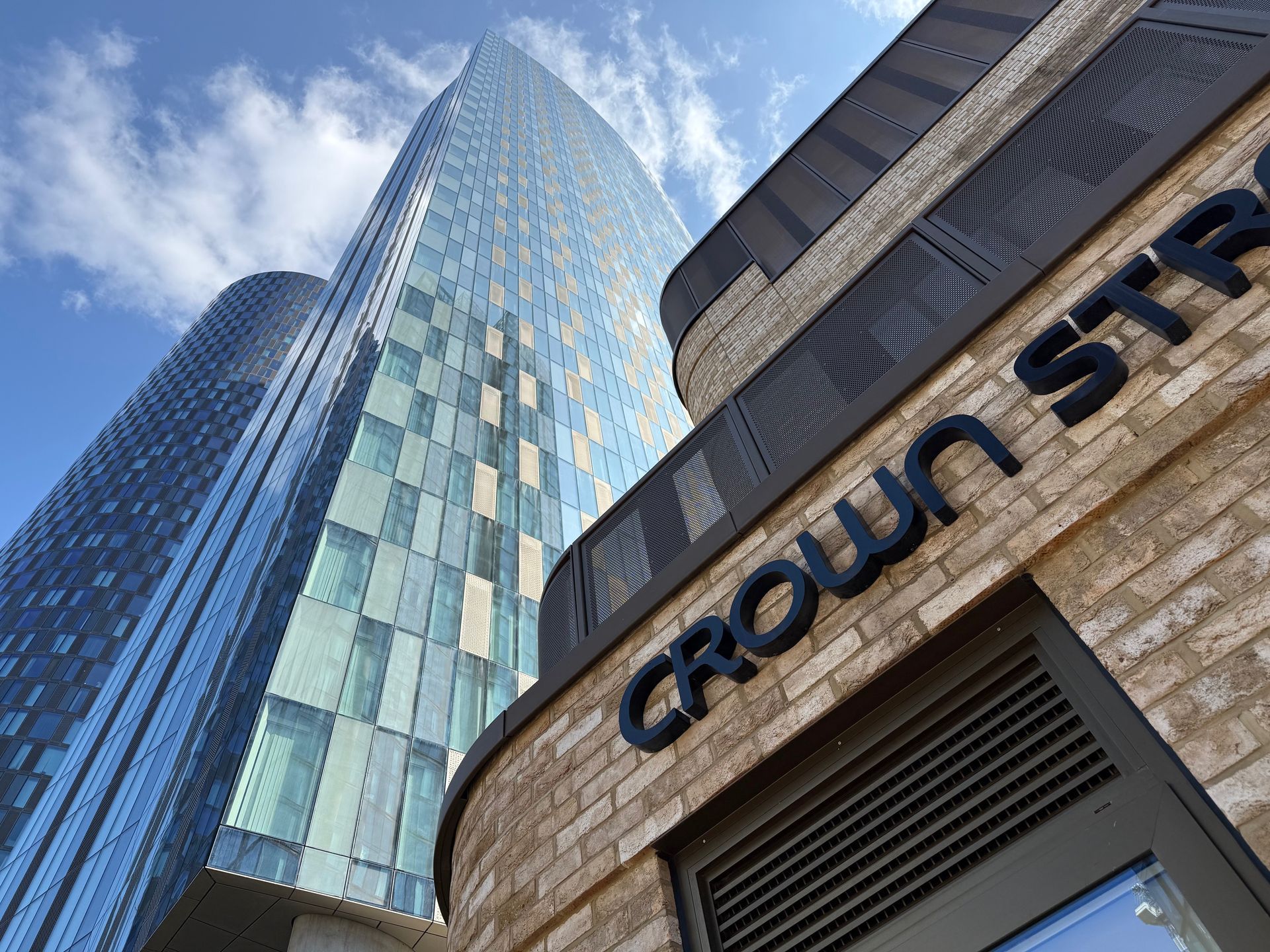 High-rise buildings with mirrored glass in Manchester, UK, with 