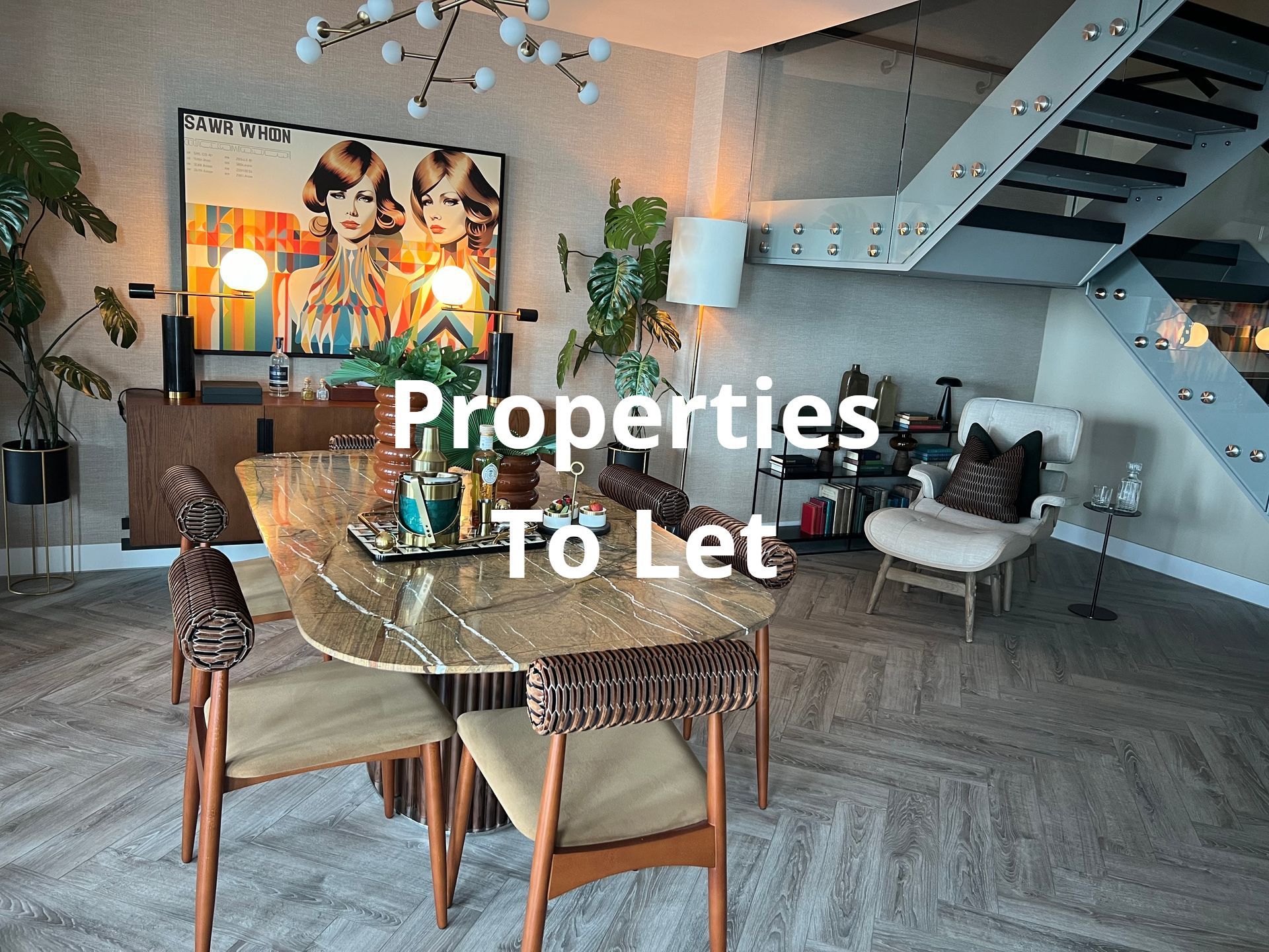 Dining room with table, chairs, art, plants, and Properties To Let text overlay.