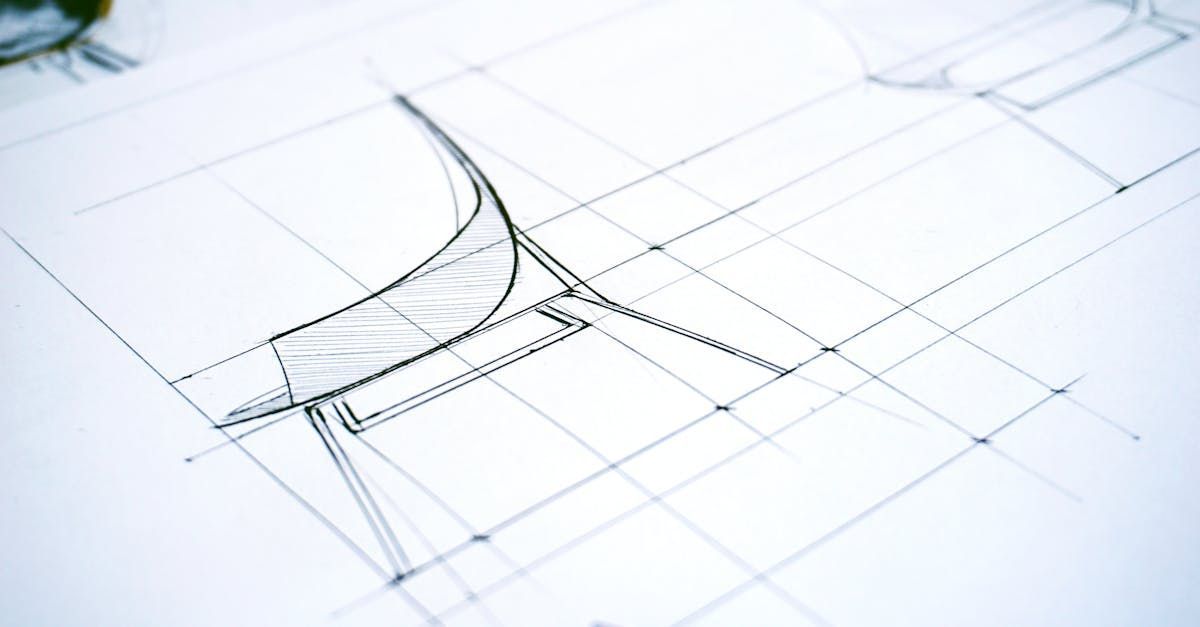 Architectural sketch of a chair with a curved back, drawn with pencil and ink on graph paper.