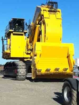 Yellow Excavator — Tuscaloosa, AL — Hank's Auto Glass, Inc.