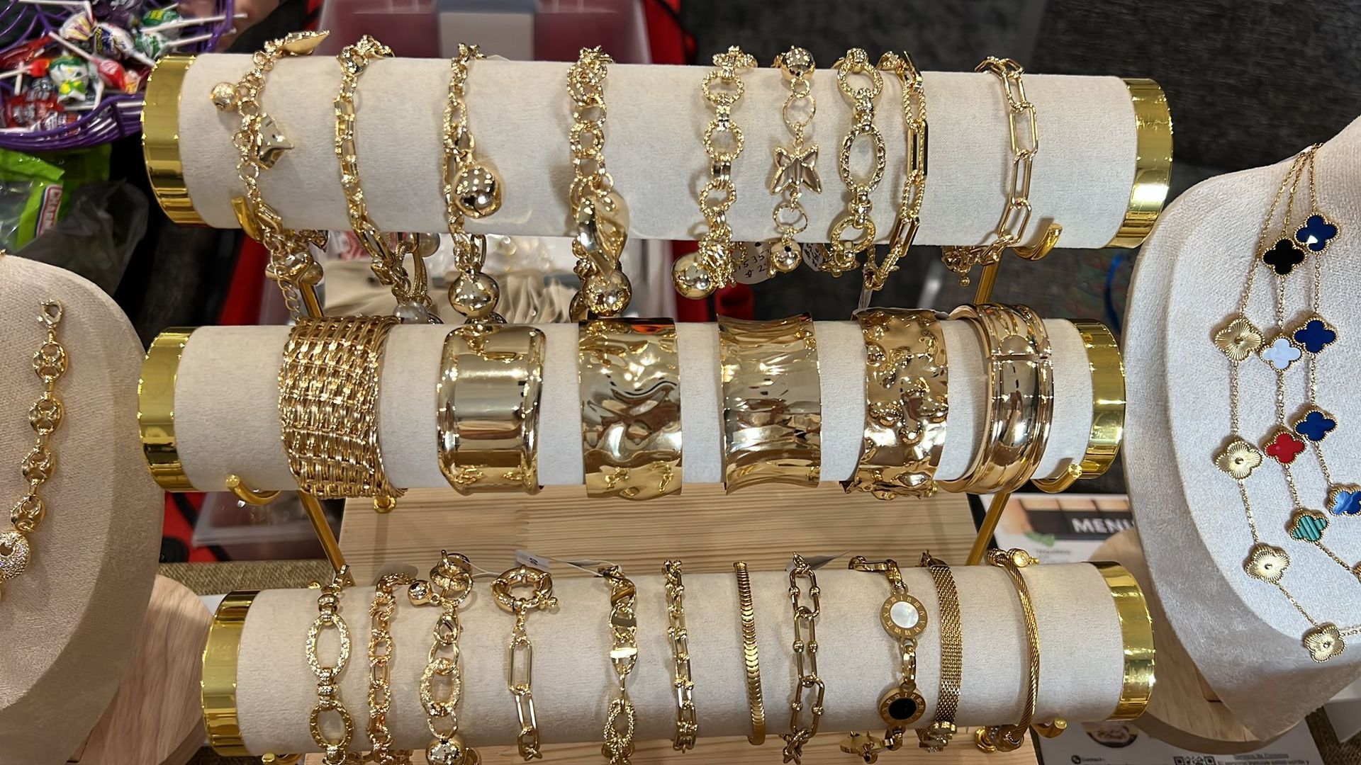 A display of gold bracelets and necklaces on display