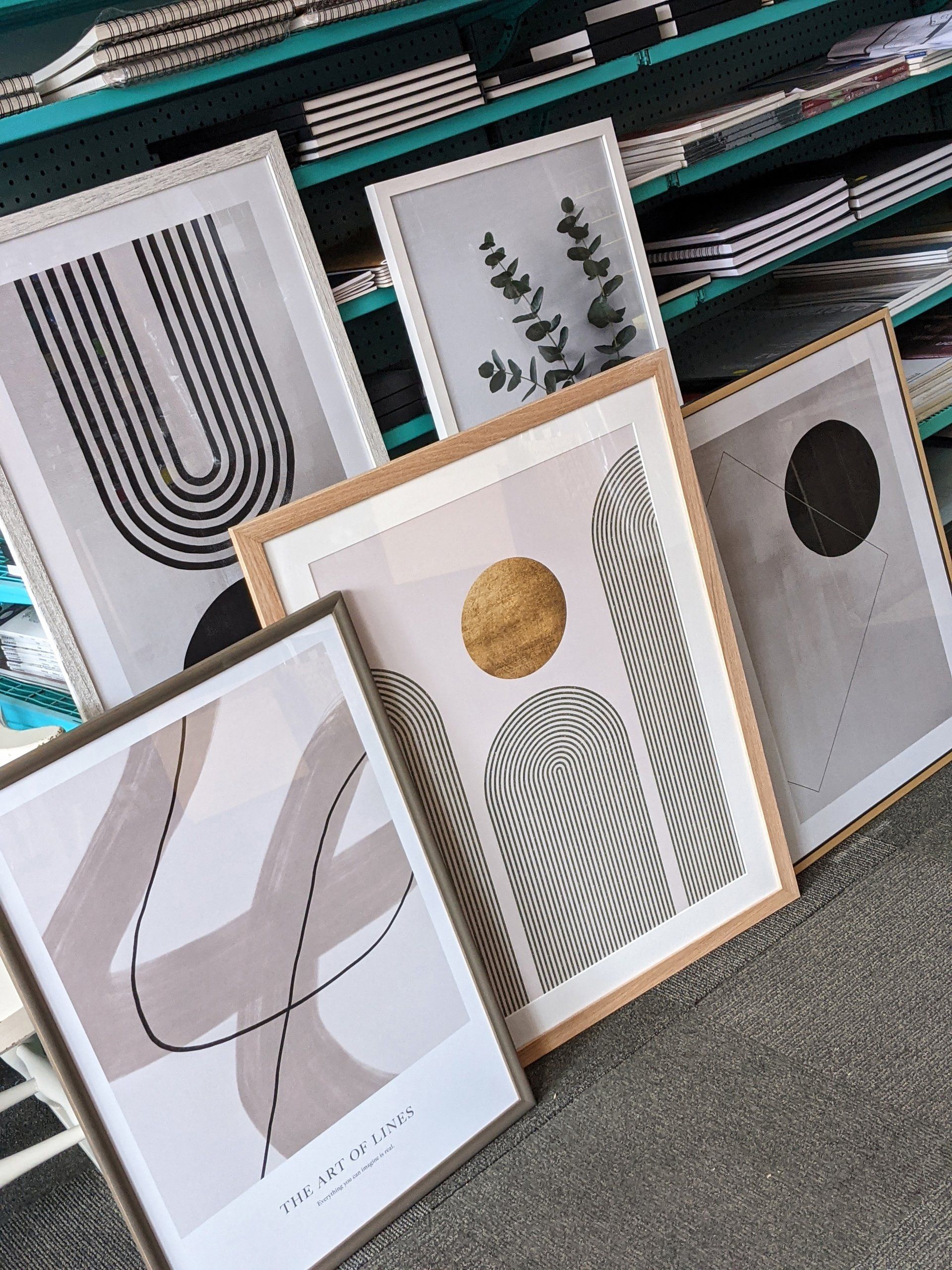 artwork framed and hung on the wall for display