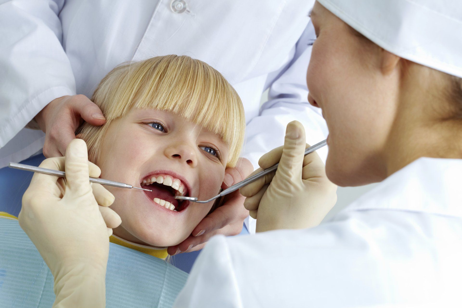 Kid Getting His Teeth Examined — Houston, TX — On-Site Oral Surgery