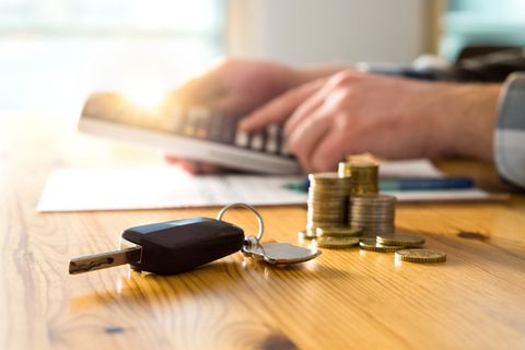 Environmental Taxes — Car Keys and Money on Table in Crystal Lake, IL