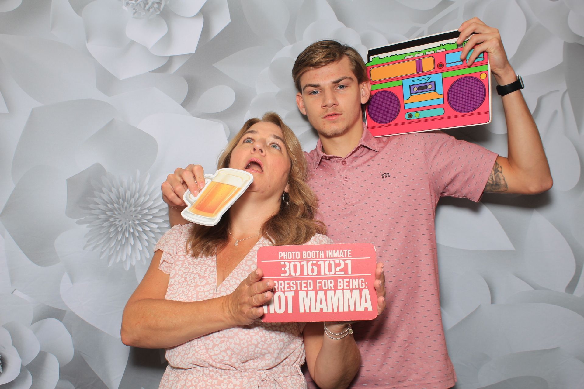 people using 80s props in a photo booth in feasterville-trevose