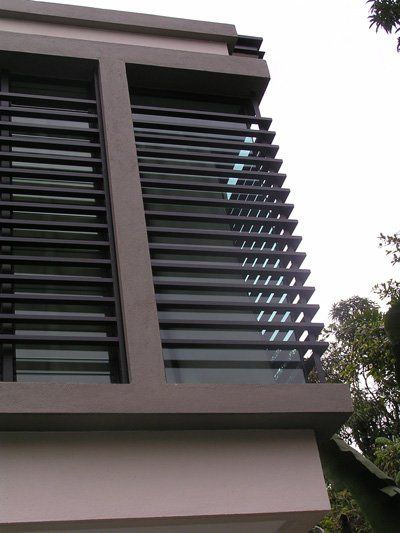 A building with a balcony and a lot of windows