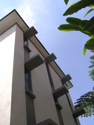 Looking up at a building with a blue sky in the background