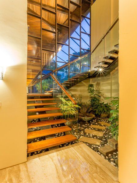 A staircase in a house with a lot of windows