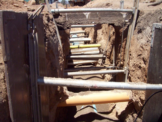 Professional Water Main Installation Services — Congested Trench in Tucson, AZ