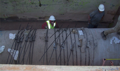 Demolition — Man Doing Repair on Giant Culvert  in Tucson, AZ