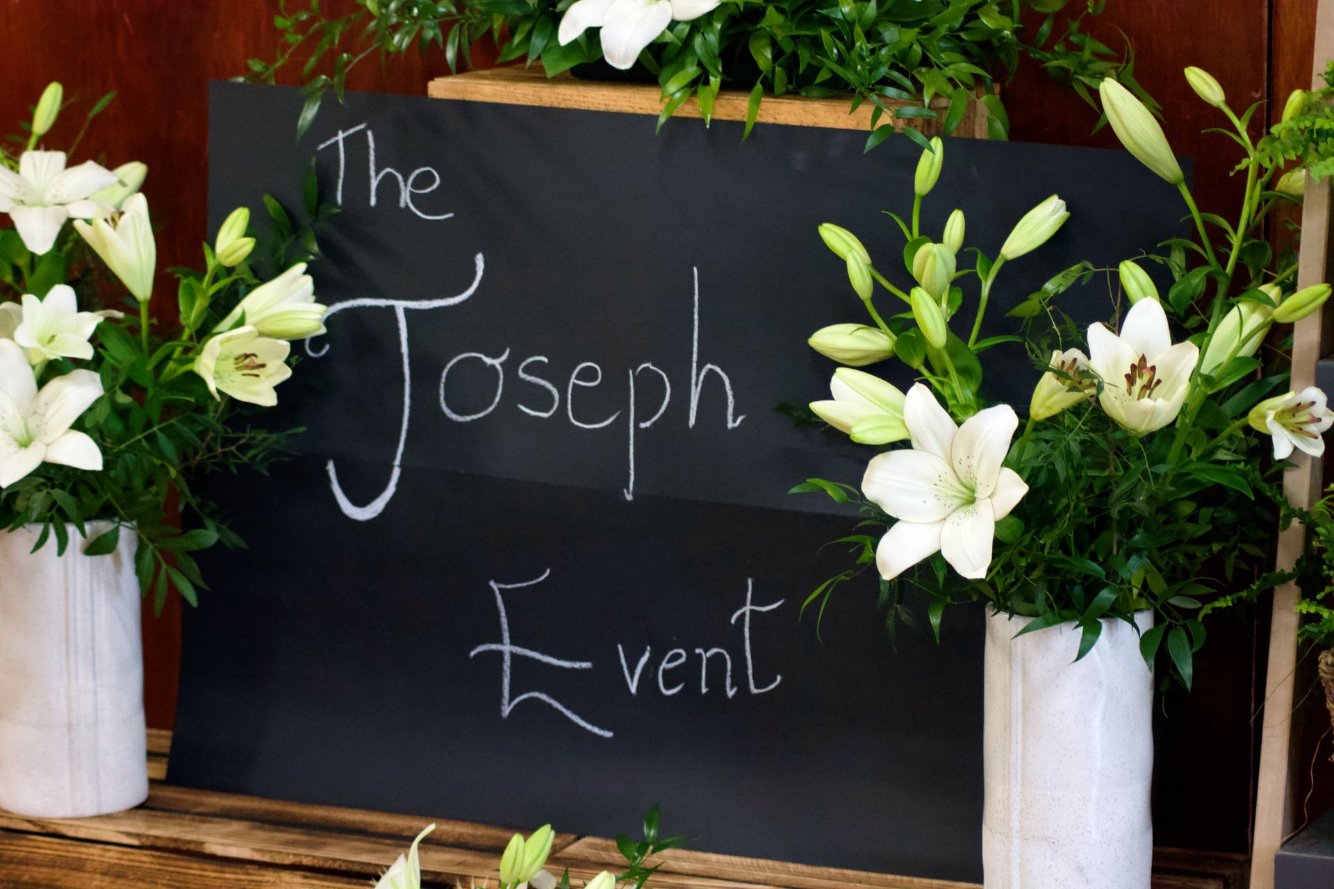 A chalkboard with the words the joseph event written on it