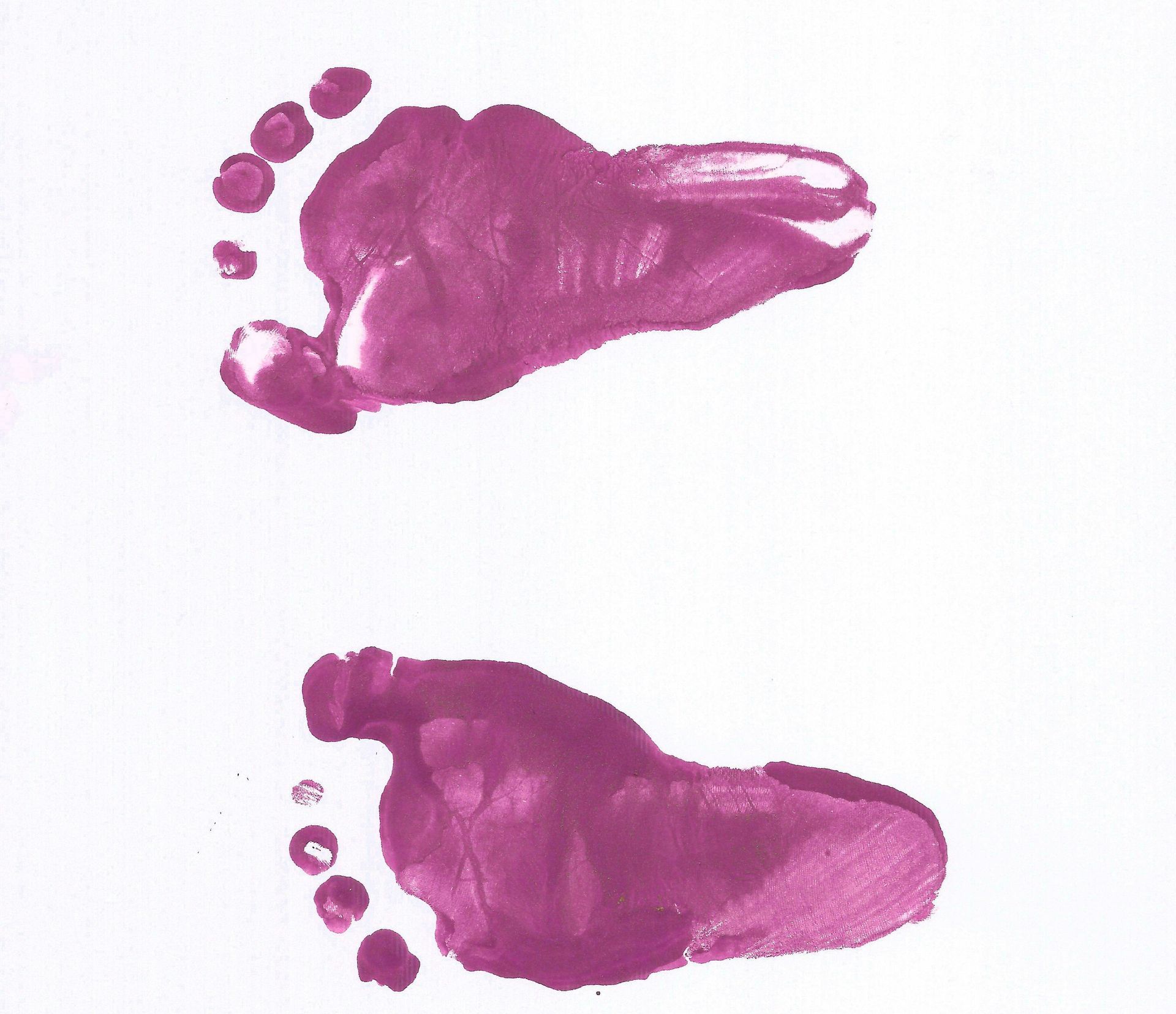 Two purple foot prints, possibly of a baby or small child.