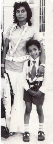 A black and white photo of a woman holding a child