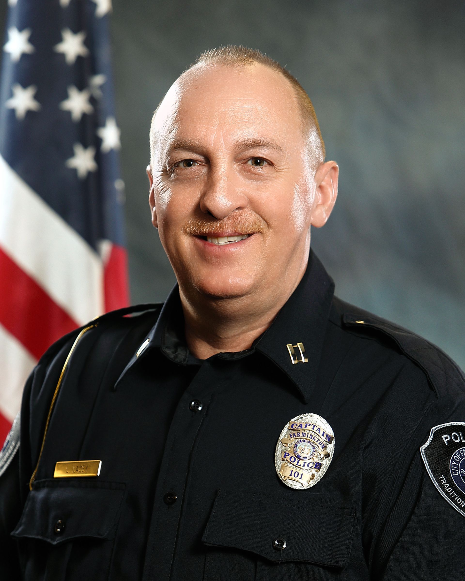 Police Captain Larry E. Lacey