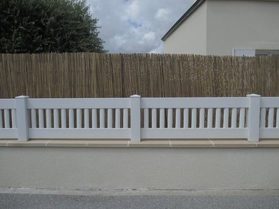 PVC Fence Mounted on a Wall Closed Garden — Atlanta, GA — West Georgia Fence Co