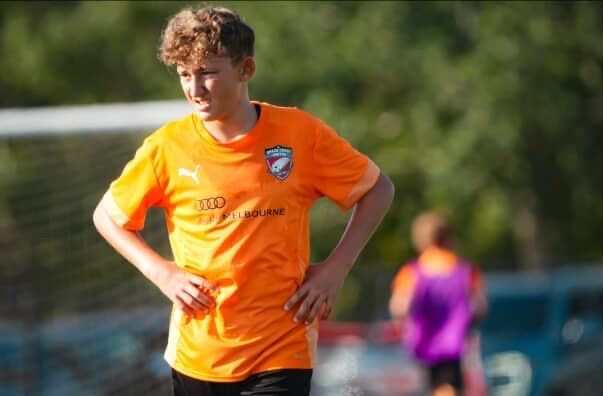 Space Coast United Soccer girls team with a trophy