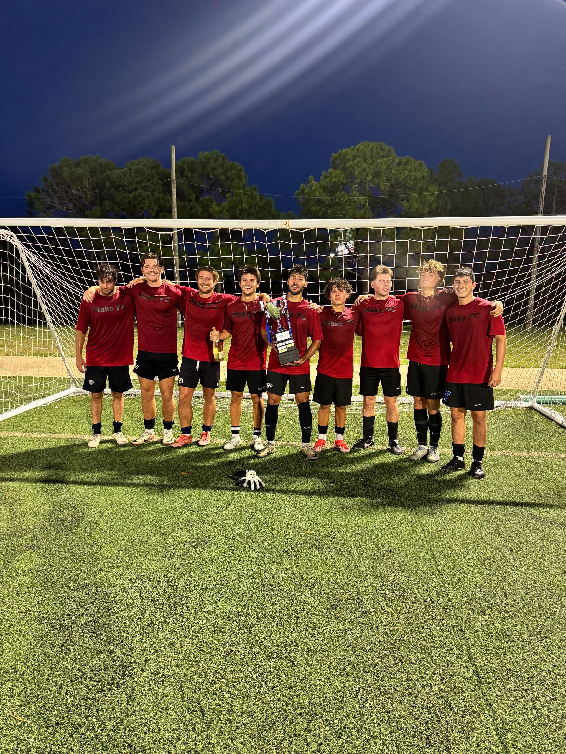 Space Coast United Soccer girls soccer team with trophy