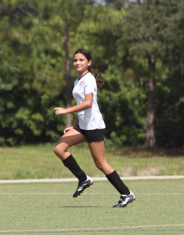 Girls playing soccer for Space Coast United Soccer