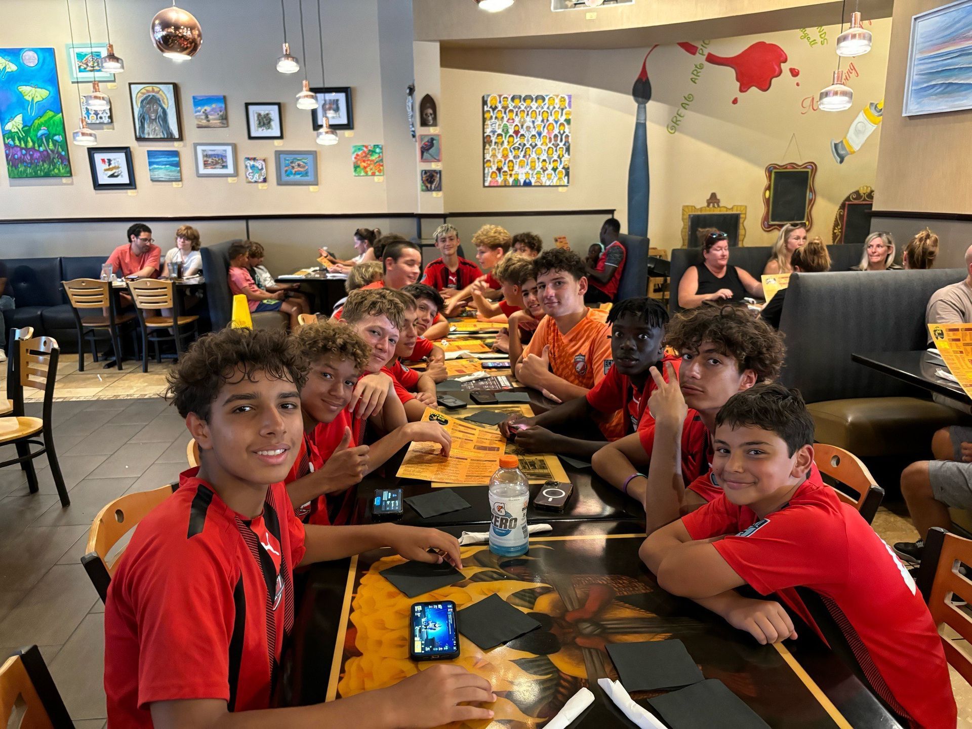 Five smiling children looking at the camera