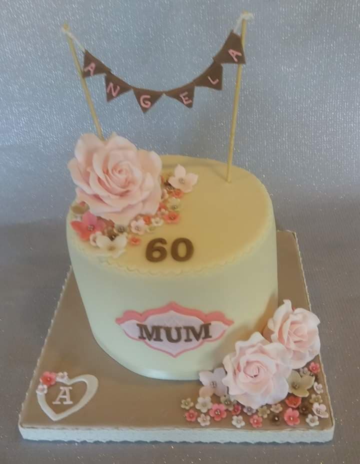 bunting birthday cake with flowers roses