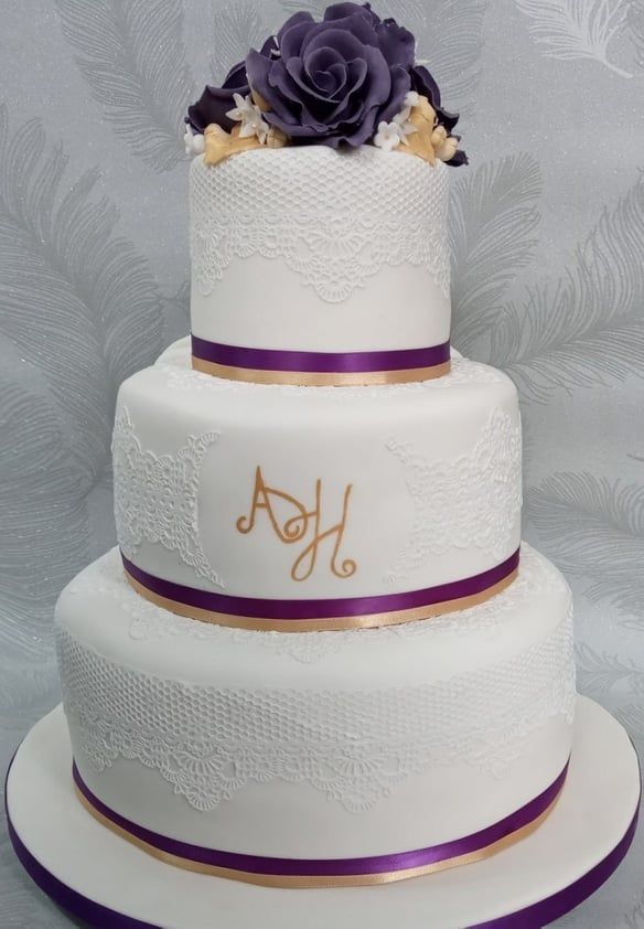 wedding cake purple and gold with cake lace