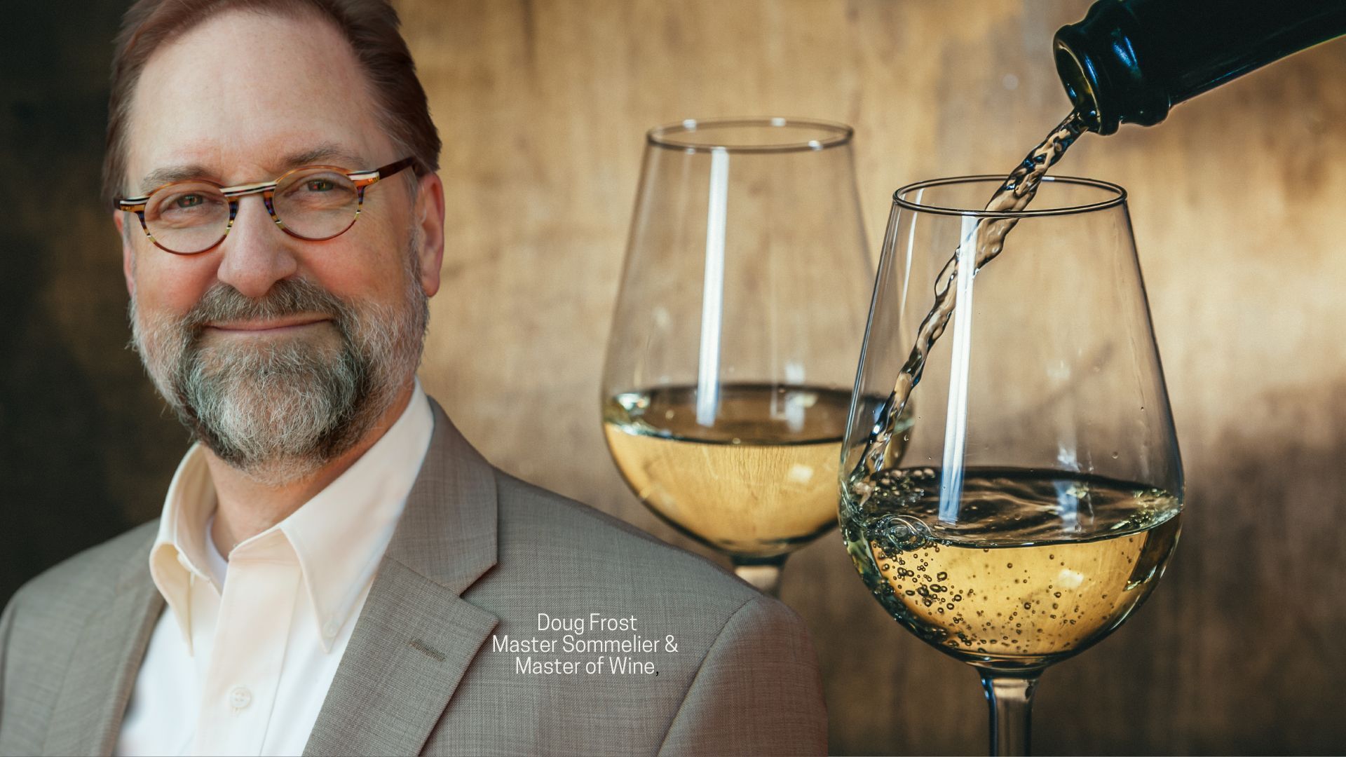 Sommelier and white wine pouring 