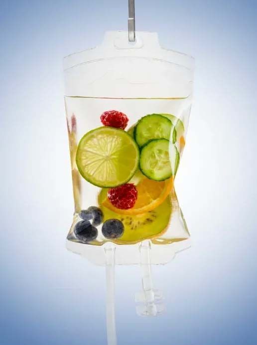 A bag filled with a healthy diet is hanging from a pole.