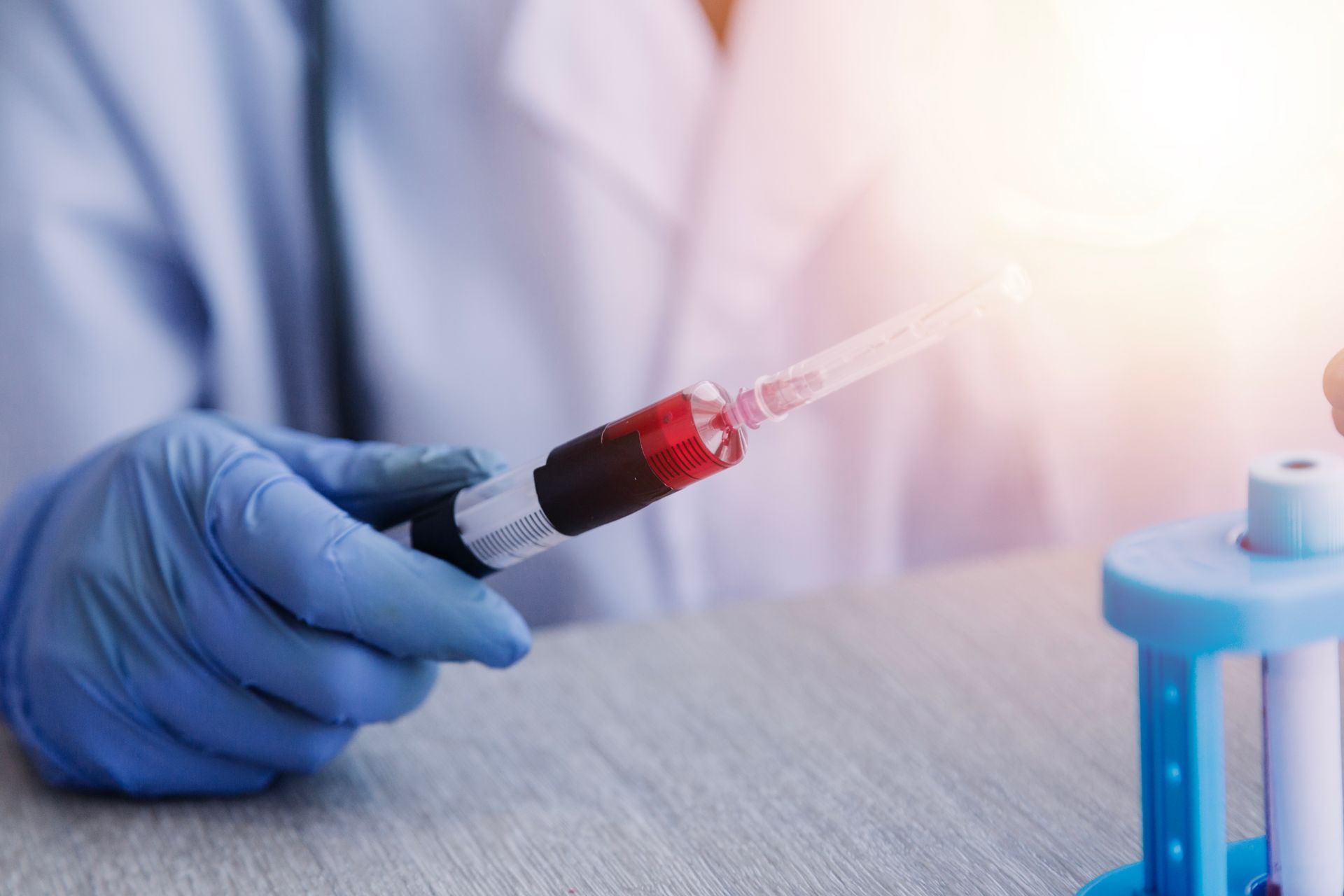 a doctor utilizing PRP injections for patient