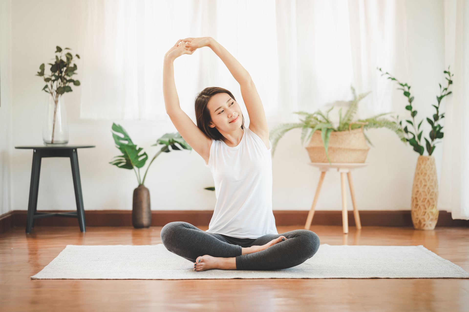woman doing yoga at home