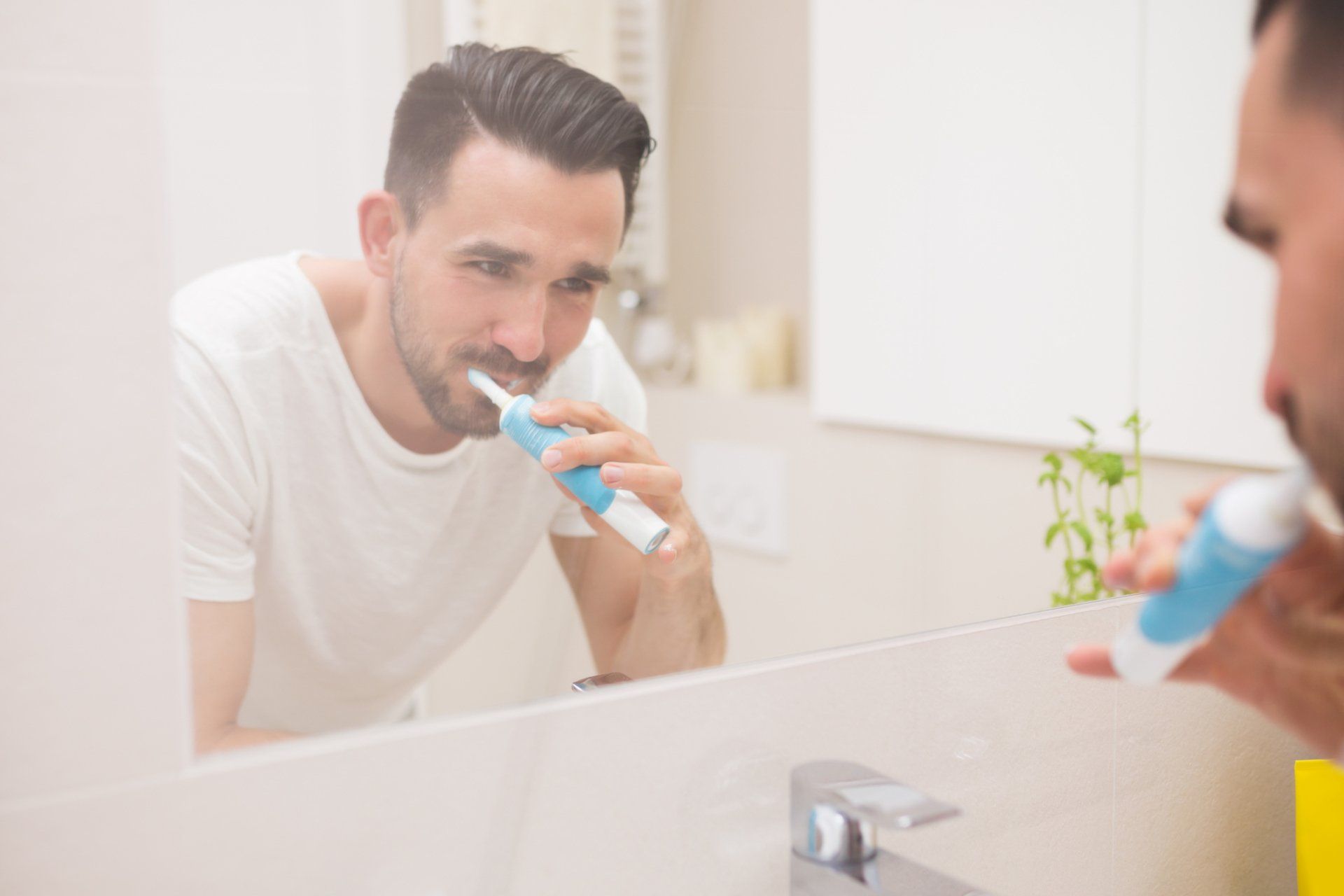 Man Brushing his Teeth