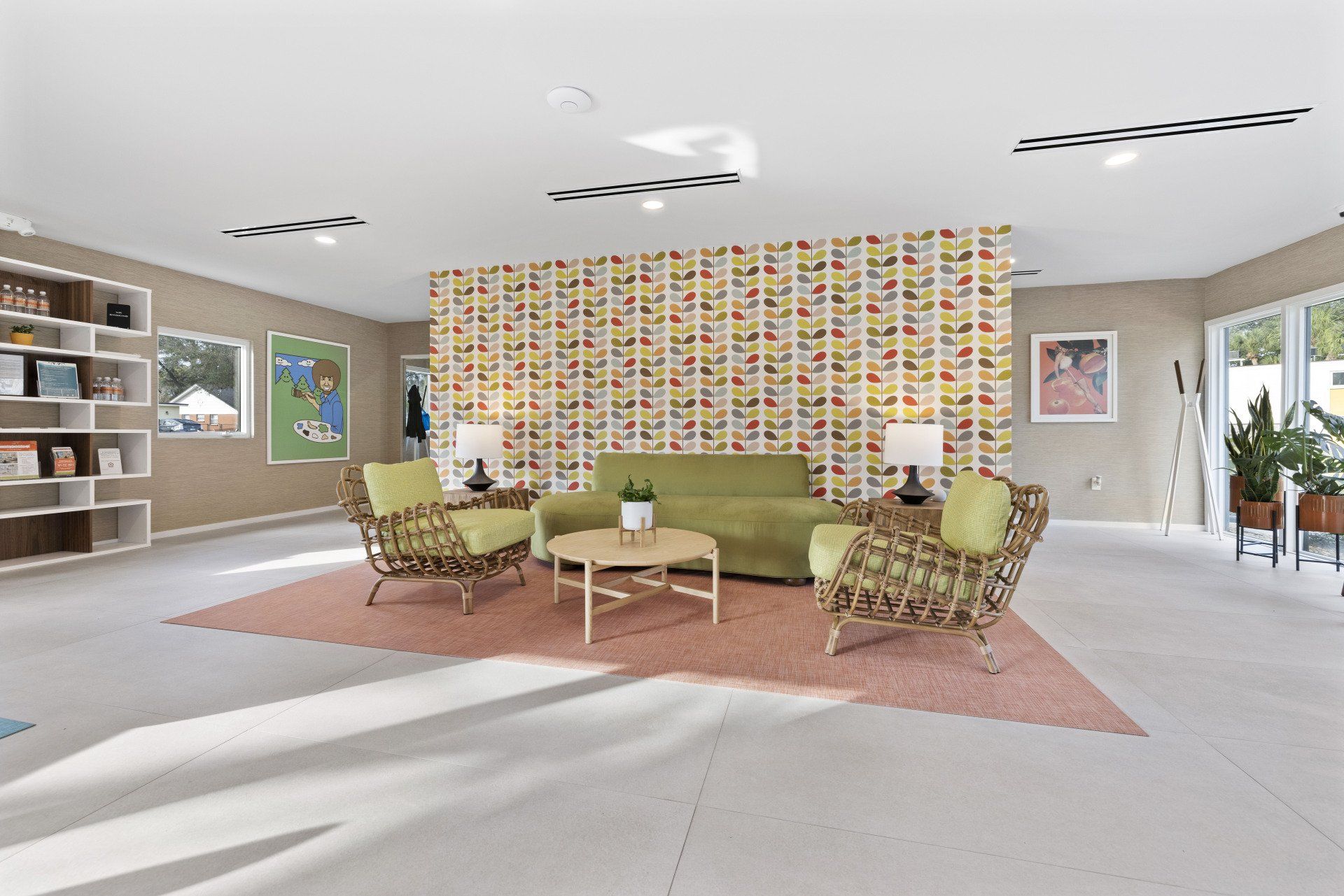 Hale Nani apartment community clubhouse with modern design. and light green sofa.