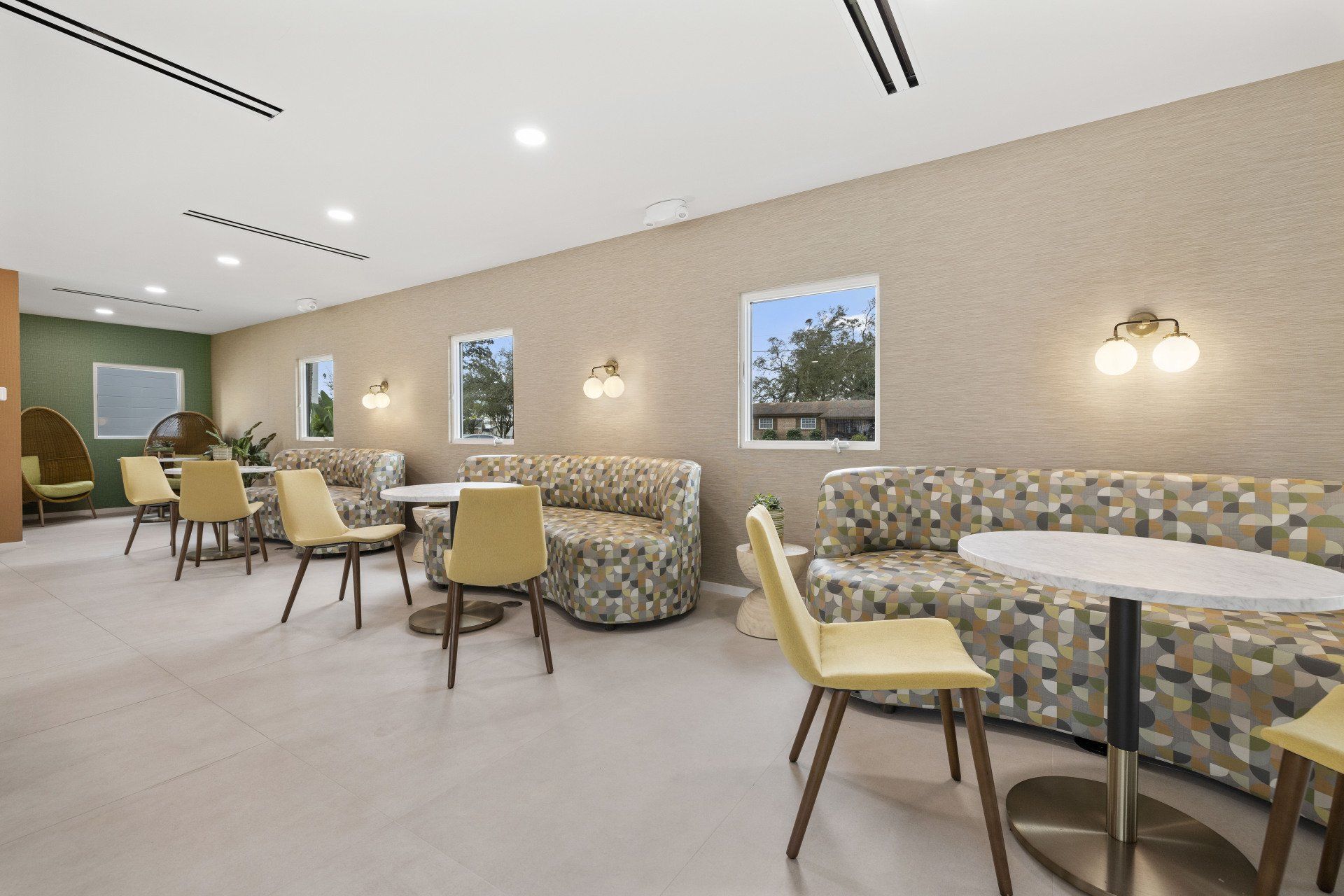 Hale Nani apartment community clubhouse with seating area.