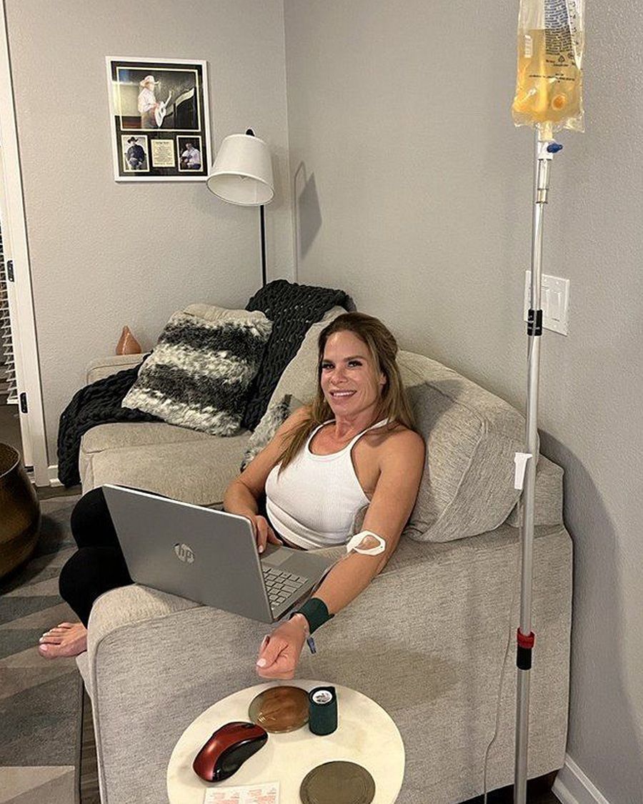 Convenient mobile IV hydration service allowing a professional to multitask and work from the comfort of her home.