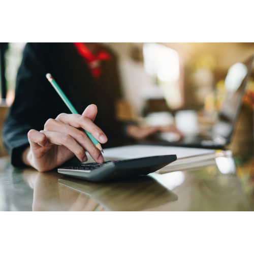 picture of a women with a calculator about to do a car repair quote