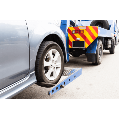 Picture of a car being towed to a panel beater in Greenstone