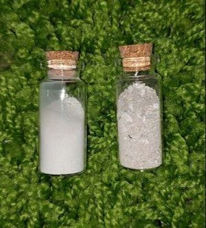 image of a vial of water cremains on the left, and flame cremains on the right