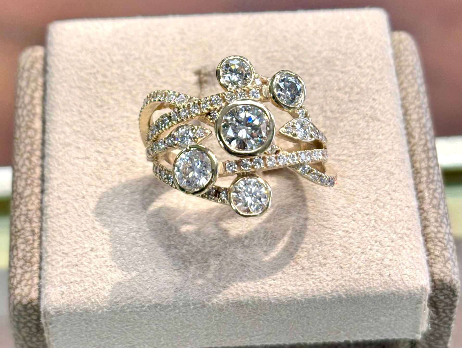 A close up of a ring on a display case