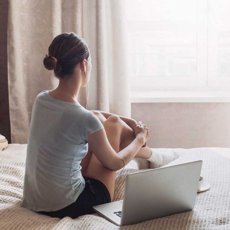 Woman Thinking on a bed - Go Life Women's Service