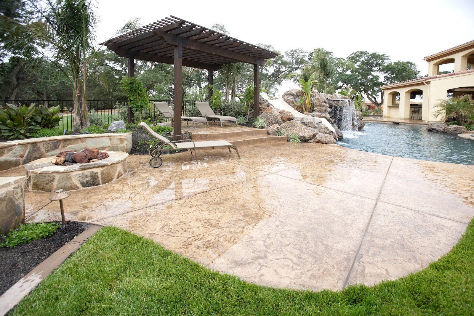 stamped concrete pool deck designed and installed by Naples Concrete Solutions for a residential property in Bonita Springs, FL