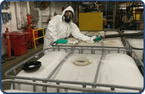 Men in protective suit working - Industrial Maintenance and Response Services in Wichita, KS