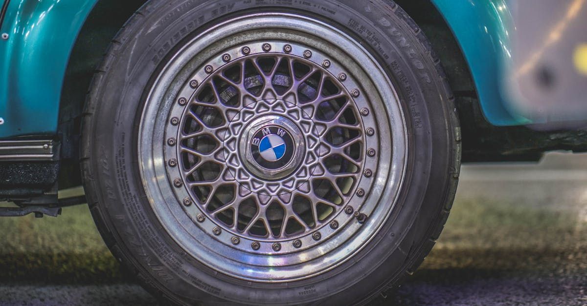 A close up of a car wheel with a bmw logo on it.  | Modern Brake & Alignment