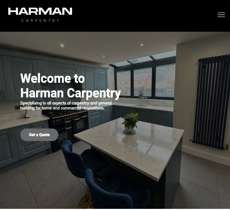 The website for harman carpentry shows a kitchen with blue cabinets