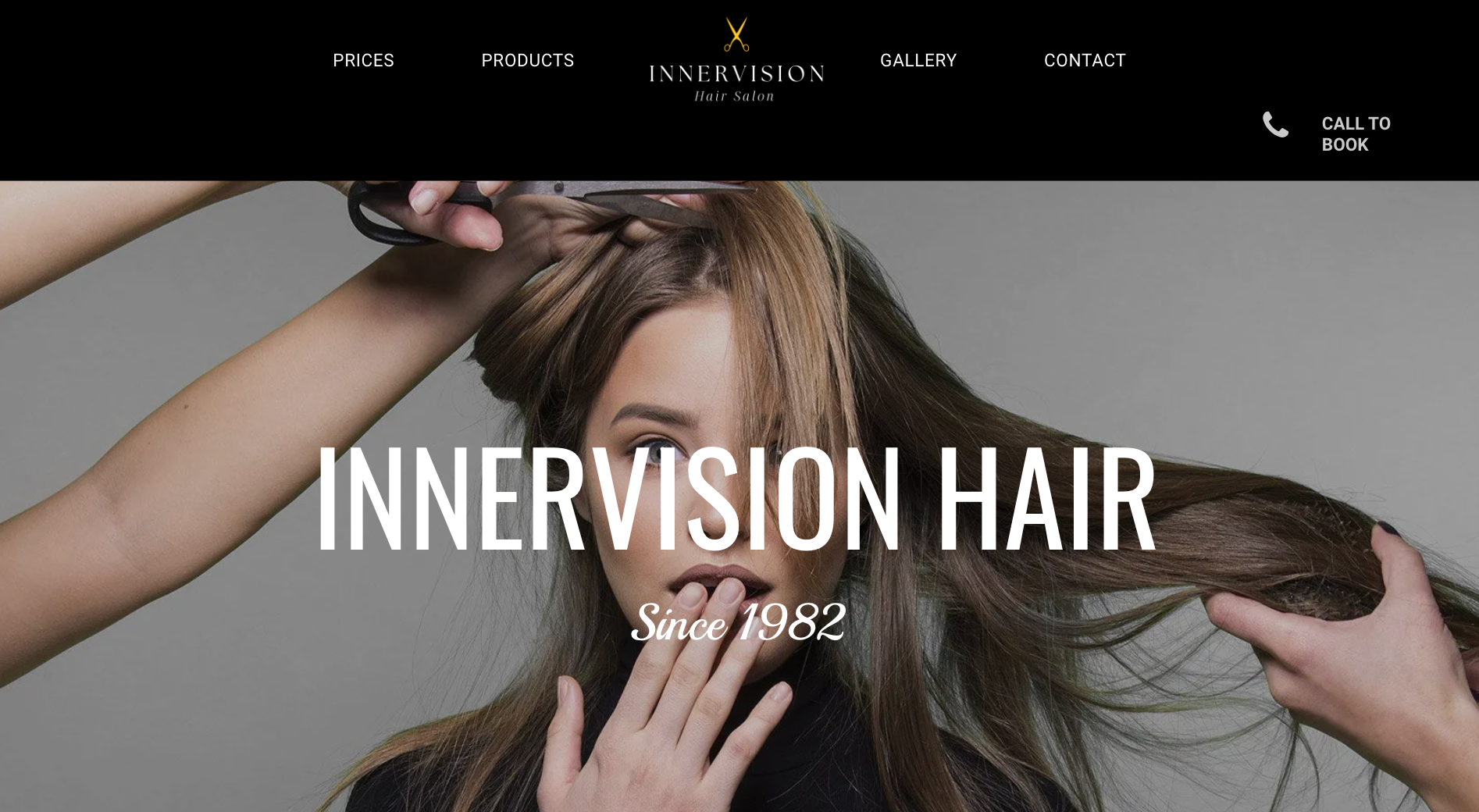 The website for innervision hair shows a woman getting her hair cut.